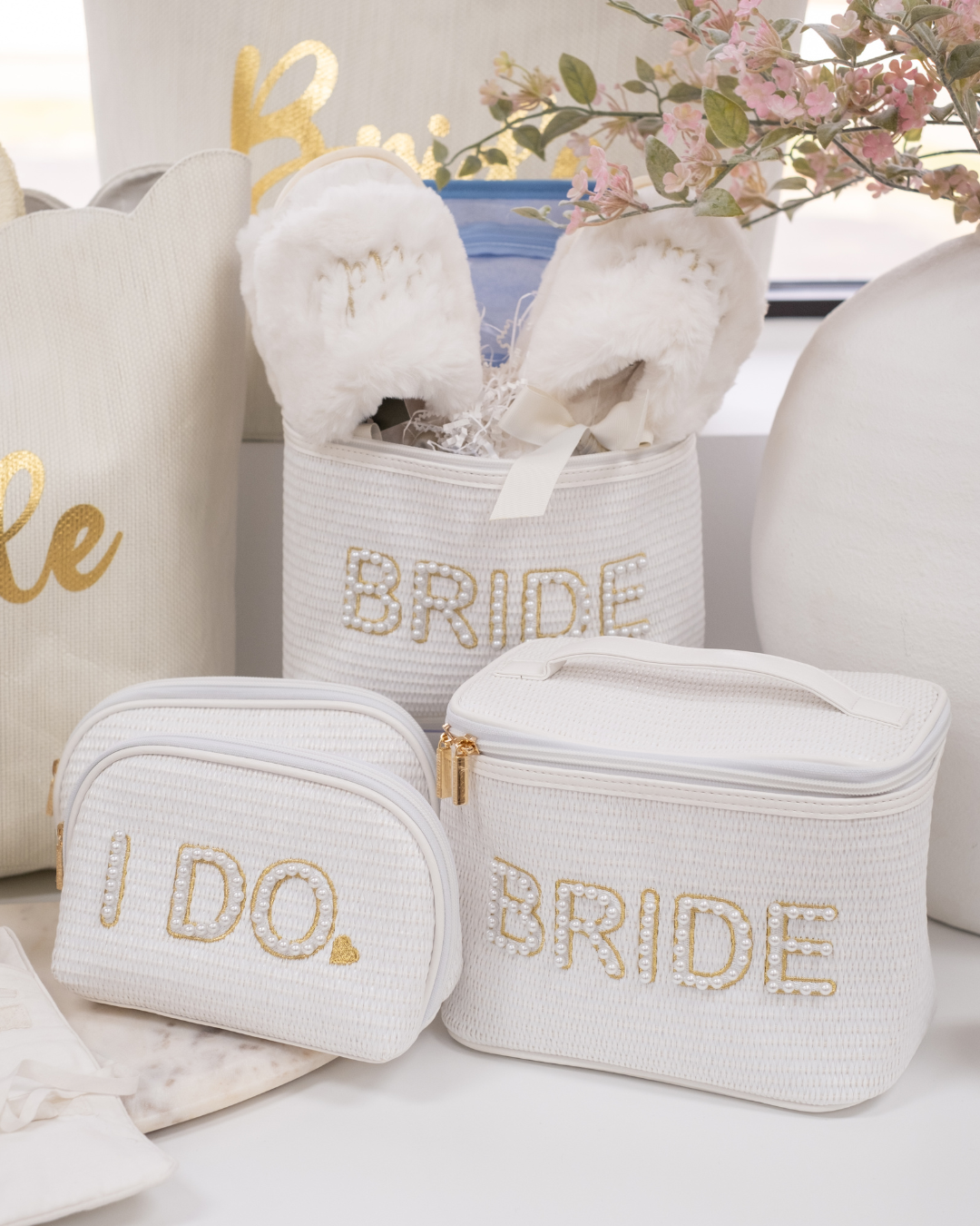 Ivory White Faux Fur and Gold Embroidery Script Bride Slippers styled in Cosmetic Case with Bridal Collection