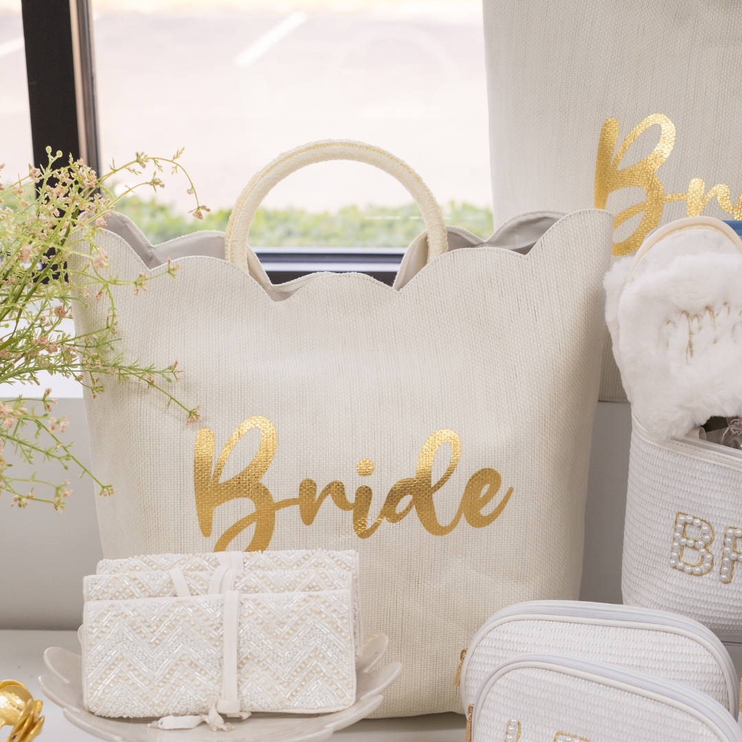 Ivory White Scalloped Edge Gold Foil Script "Bride" Tote Bag Styled for Display with Amabella White Beaded Jewelry Holder