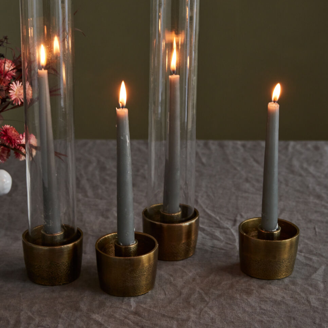 Estoria 4-Piece Round Modern Cast Aluminum Antiqued Gold Finish Taper Candle Holder Set styled for Tablescape with Cylinder Glass Candle Sleeve