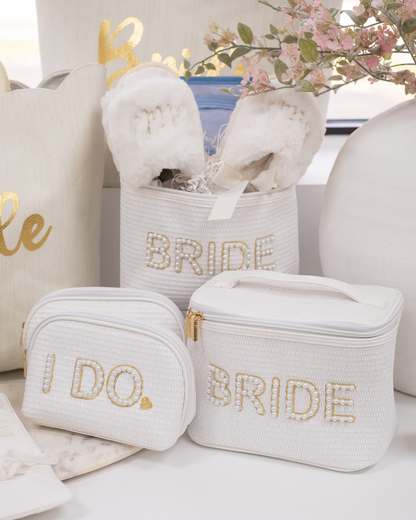 For The Bride Collection Cosmetic Case, Tote Bags, Zipper Pouch, Slippers, Styled Next to White Vase and Pink Florals