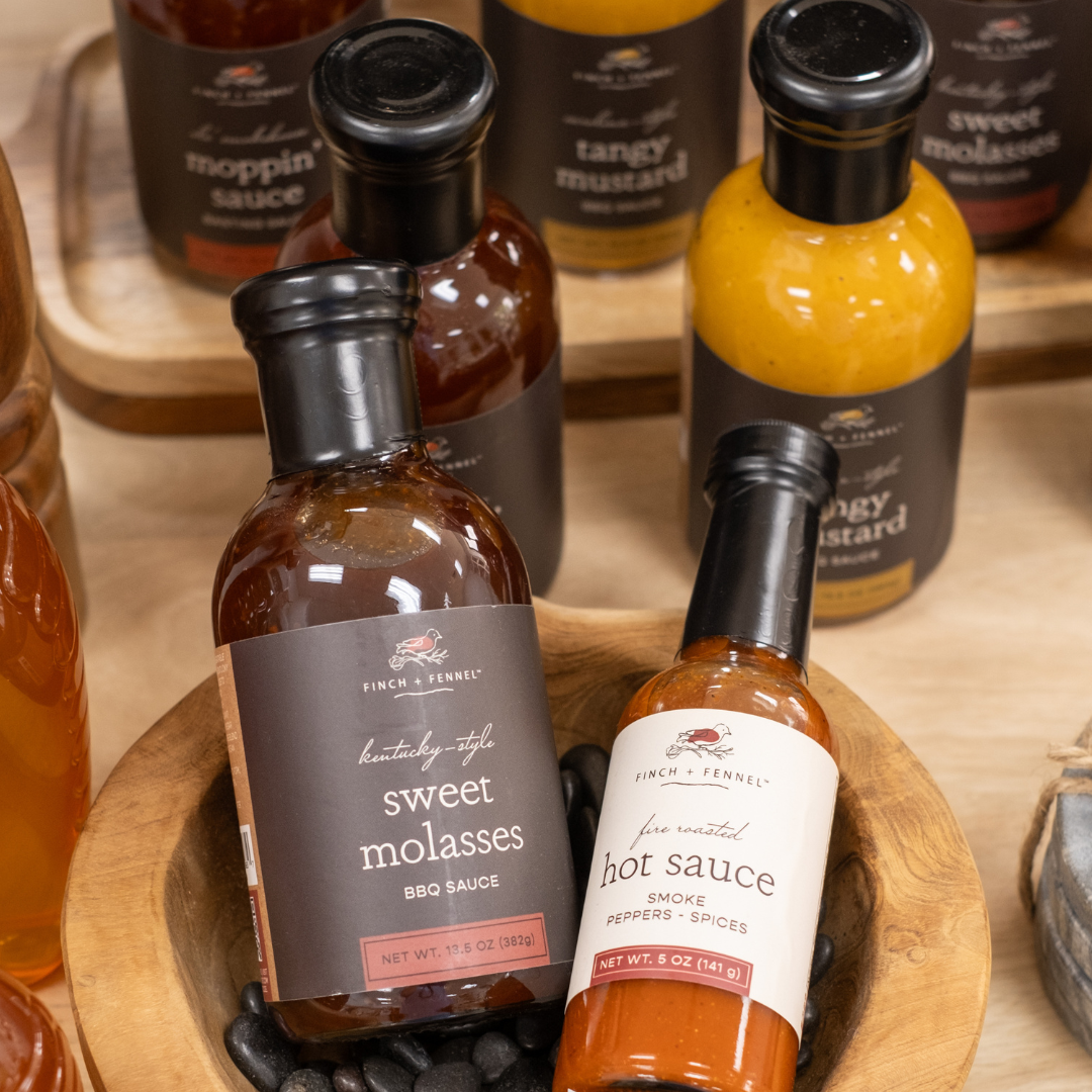 Sweet Molasses Kentucky Style BBQ Sauce Displayed with Hot Sauce