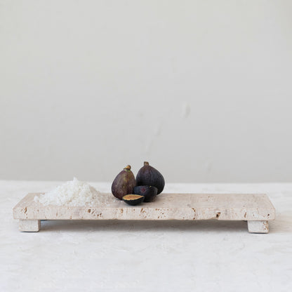 Footed Greige Travertine Serving Board or Decorative Display Piece Styled with Coarse Salt and Fresh Sliced Figs